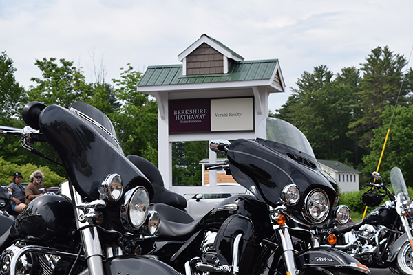 motorcyles parked in front of Belmont sign