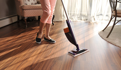 sweeping hardwood floor