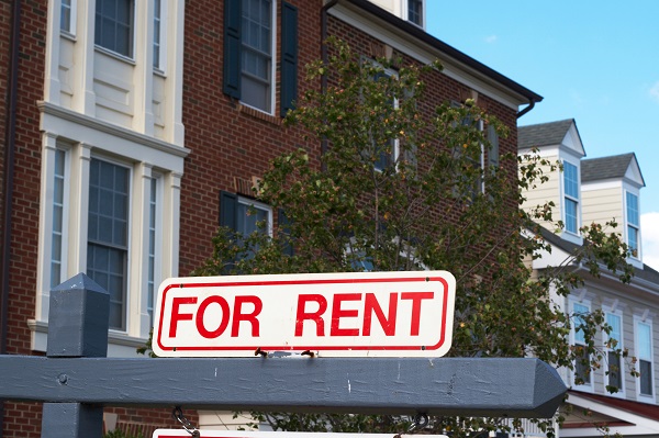 For rent sign in front of apartment