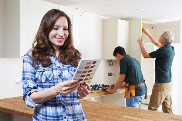 woman looking at paint colors